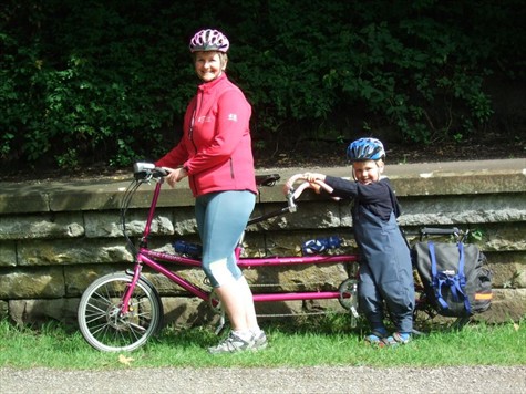 mum cycling with child