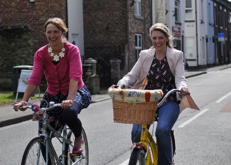 Smiling cyclists